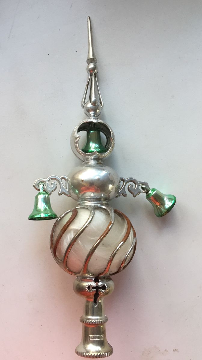 A vintage Bradford tree topper complete with bells and angel hair. Some of the silver finished has rubbed off yet it would still look great on a tree or on display. 