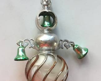A vintage Bradford tree topper complete with bells and angel hair. Some of the silver finished has rubbed off yet it would still look great on a tree or on display. 