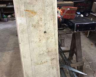 Metal shelves and bracket are ready to be installed in a new place. 