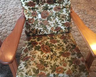 A solid wood frame supports a couple of floral cushions to make this a sturdy, comfy chair. Two are available. 