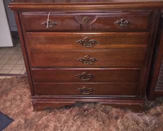 A smaller chest of drawers with ample space for storing clothes. Or, fit it in a dining room as a small buffet capable of holding flatware, table linens and other dining essentials. 