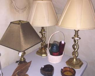 Lamps, candles and ashtrays, now often used as coin dishes and little catch-alls, are ready for living room tables. 