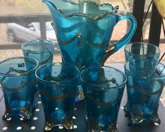 A Victorian pitcher with six matching tumblers. Imagine this lovely set on a blue holiday tablescape.
