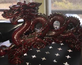 A resin dragon has lots of details that encourage a longer look and maybe even a touch. 