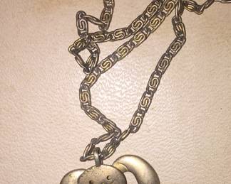 Sure to evoke childhood memories is this Avon bunny pendant with moveable ears from the 1970s. 