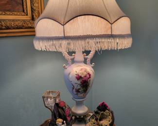 Vintage lamp on piecrust table