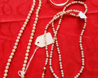 Real Pearls on the left w/gold kt clasp. Real Pearls on the Right. 