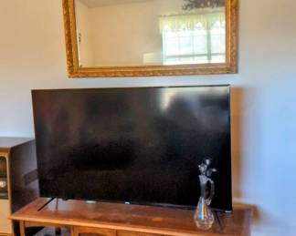 VERY Large ROKU Television - TV stand sold seprately.