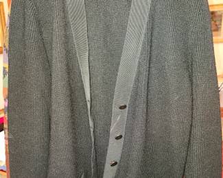 Although they look like a man's sweater....it's two circa 1980's Vintage collectible women's Ferragamo sweaters.