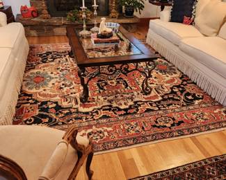 Leather, Wrought Iron and Glass Coffee Table. Two White Sofas with Fringe. 