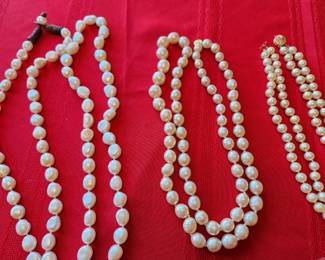 On the Left.. Barque Cultured Pearls-Wonderful. In the Middle...Pearls and 14Kt Gold.  On the Right Coco Chanel 1983 simulated Pearls. 