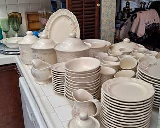 Set of Pfaltzgraff Dishes "Tea Rose" Pattern including several additional pieces for this set; gravy, sugar/creamer; canister set and much more.