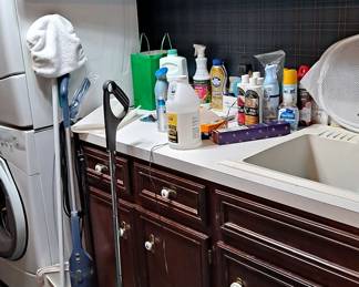 Assortment of cleaning goods & supplies for the home, including a Bissell Featherweight sweeper, Swiffer; and a Shark Euro-Pro, plus much more!