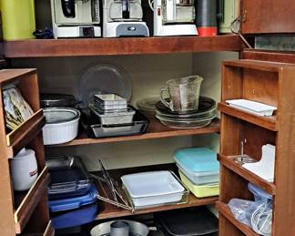 Loads of Cookware, including; baking pans; spring form pans; muffin pans and more; several coffee makers; measuring cups; plastic, metal and glass storage containers and so much more!
