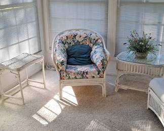 White Wicker Set with Floral Upholstery: One Chair, One Rocking Chair and a Love Seat, including a multiple Side / End Tables; and Silk Plant(s).