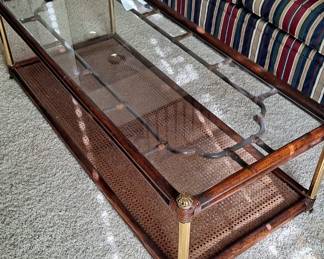 Wood Glass Topped Coffee Table with Cane and Brass Detailing.