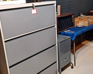 4 Drawer Lateral File Cabinet with Keys; Rolling 2 Drawer File Cabinet; Assorted Office Supplies and much more.