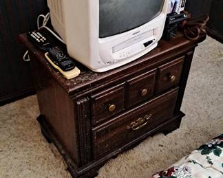 Dark Wood Bedroom Suite includes 2 Drawer Night Stand; White Admiral TV/VCR Combination Box TV (great for watching old video tapes in camper or for kid's area!); and a Vintage Push Button Phone.