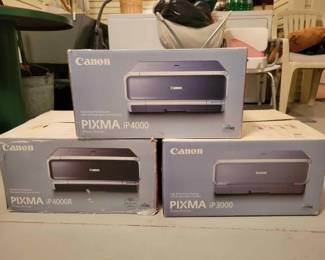 #1924 • 4 Canon Photo Printers and 1 Dell Key boared and two Dell Mouses.
