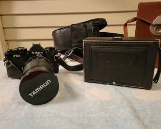 #1993 • 2 Vintage Cameras and accessories.
