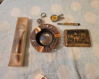 #1990 • Alaska ash tray. Cigarette holder Bottle Opener.
