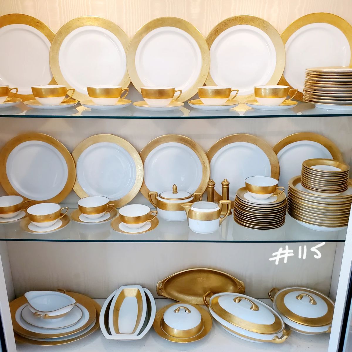 Rosenthal set of white and gold dishes. 83 pieces. $800