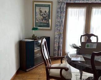 stereo and speakers, picture, rug, dining room table and chairs