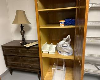 dresser, lamp, ladder