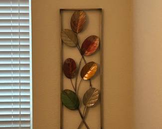 Red and yellow metal wall art