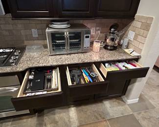 Kitchen utensils, toaster over, stand mixer