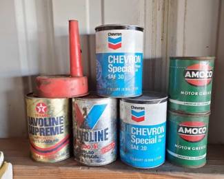 #10526 • (4) Quart Cans of Motor Oil, (2) Cans Of Motor Grease and Funnel
