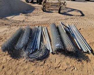 #16 • Rolls of Chain Link Fencing, Steel Poles, and Tension Wire
