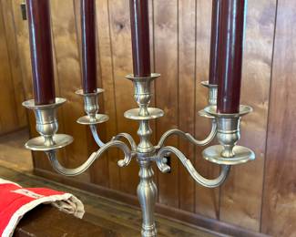 One of two silver candelabras 
Different designs