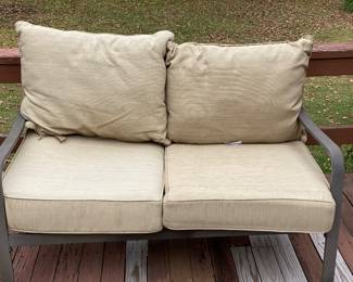 2 seater outdoor sofa on back deck 