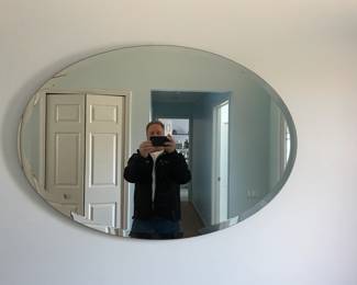 . . . large oval beveled mirror -- ignore goofy guy in mirror
