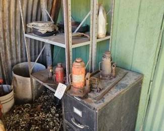 #2510 • 2 Shelving Units, 1 Filing Cabinet, 5 Bottle Jacks, 2 Ammo Cans, and More
