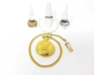 #399 • (3) Costume Jewelry Rings and Gold Toned Pocket Watch
