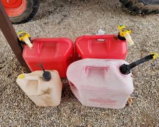 #10002 • 4 Plastic Gas cans
