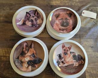 #918 • 4 Decorative Plates from The Danbury Mint
