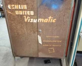 #1112 • Metal Storage Cabinet and Car Parts
