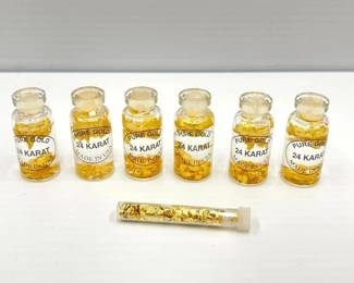 #402 • (6) 24k Gold Flake Bottles and (1) Gold Flake Tube

