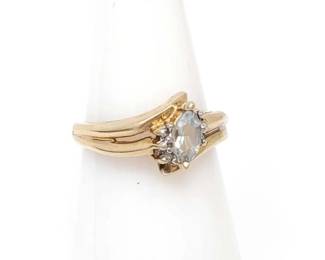 #318 • 10k Gold Ring with Light Blue Rhinestone, 3g
