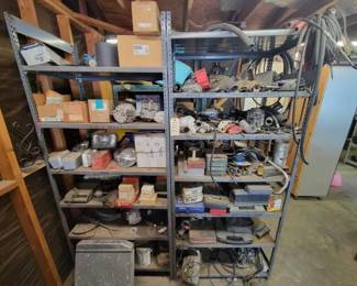 #1162 • 2 Metal Racks, Milwaukee Heavy Duty Sanders, Radiator, Alternators, Headlights, Tool Sets, Circular Saw
