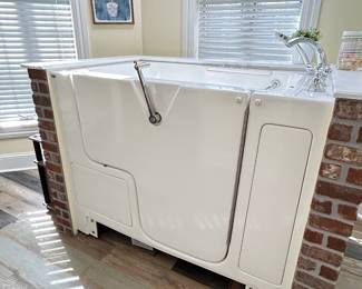 American Standard Wheelchair Accessible Walk-In Bathtub. Right opening approx 52” x 31-32” White . Buyer responsible for removal.  PRESALE NOW OFFERED
