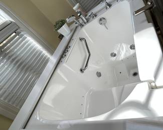 American Standard Wheelchair Accessible Walk-In Bathtub. Right opening approx 52” x 31-32” White . Buyer responsible for removal. 
