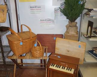 Longaberger and other baskets, tree, TV trays, child piano, luggage rack