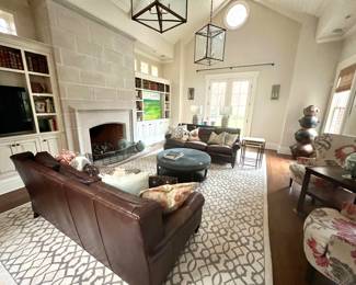 Stunning wing chairs, antique hand thrown pottery, antique fire surround, TV's, BOOKS