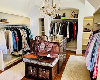 SAKS off Cary! lol The entire closet is filled with designer clothing, shoes and handbags.  