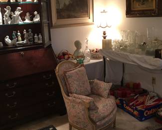 sculptor, Capo Di Monte fruit baskets, Lee Reynolds painting, Lenox, Corot framed print, decanters, candles, lotus bowls, small asian table with drawer