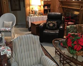 Lane Cedar Chest, brass candle holders, asian lamp, small tv, child rocking chair, coffee table, wicker patio set, pig collection, chair